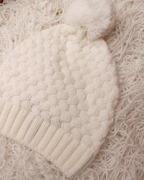 Cappellino neonata lavorato in pura lana merino
