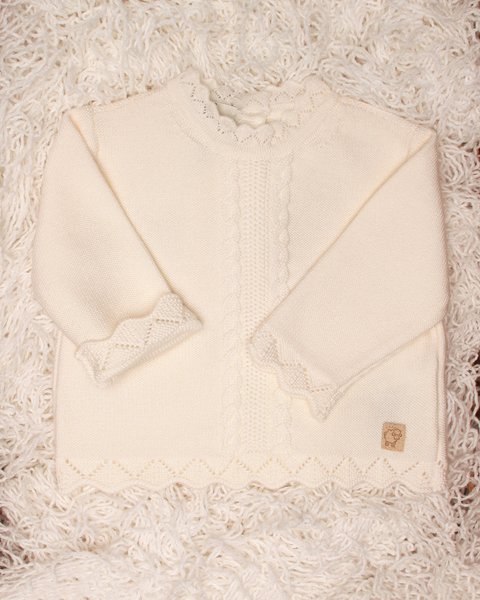 Maglia treccia punzonata in pura lana merinos per neonate